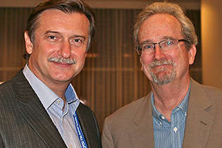 From left, Vladimir Poznyak, World Health Organization, and NIDA International Program Director Steven W. Gust, Ph.D.