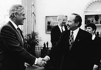 President Bill Clinton congratulates NIDA Director
Dr. Alan I. Leshner