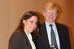 Thomas F. Babor, University of Connecticut, presenting Monica Malta, Brazil, with ISAJE/WHO Young Scholars award.