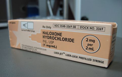 Naloxone as packaged in a box for distribution