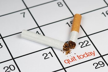 Image of calendar with cigarette snuffed out on the Quit Today date