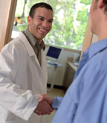 Doctor shaking patients hand